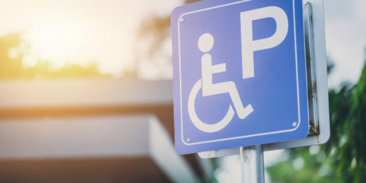 Image: Road sign depicting accessible parking