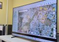 Image of Television displaying position of Buildings in Barbados, markers are used to identify buildings during emergencies.
