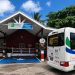 Image of the New BCD Accessible bus parked at the BCD's head quarters at Harambee House.